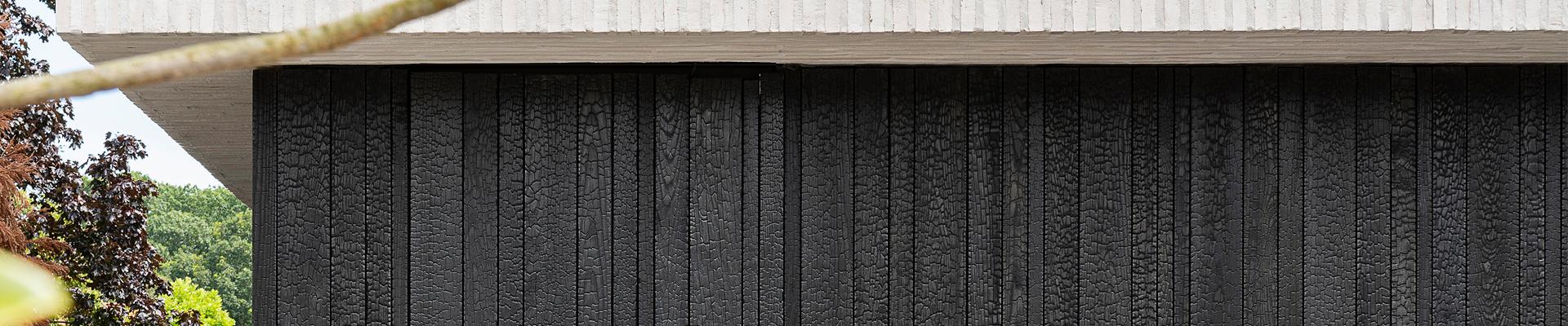 huichelarij Soepel Onderscheppen Tijdloze trend: zwarte houten gevelbekleding | Carpentier