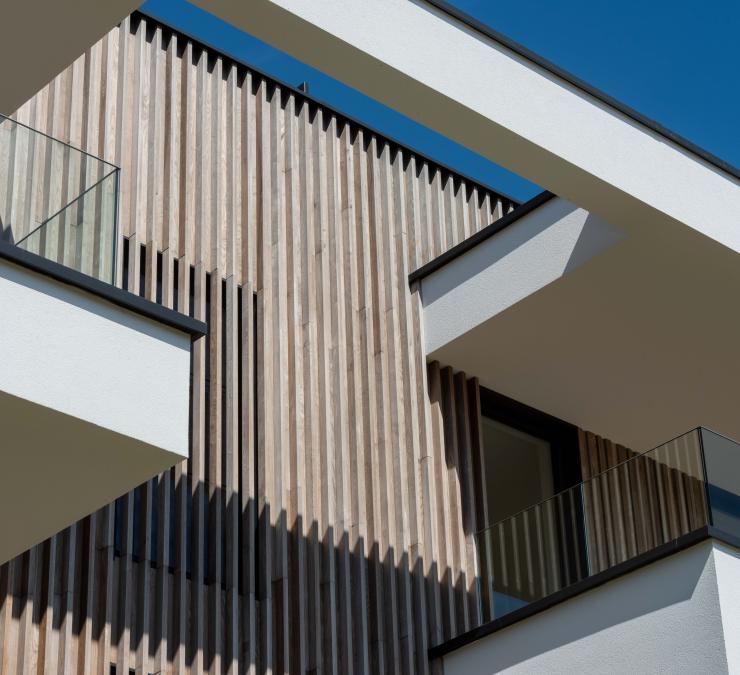 Timber cladding apartment building Wolvertem