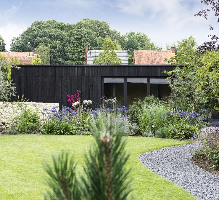 Wooden outbuilding with charred timber cladding
