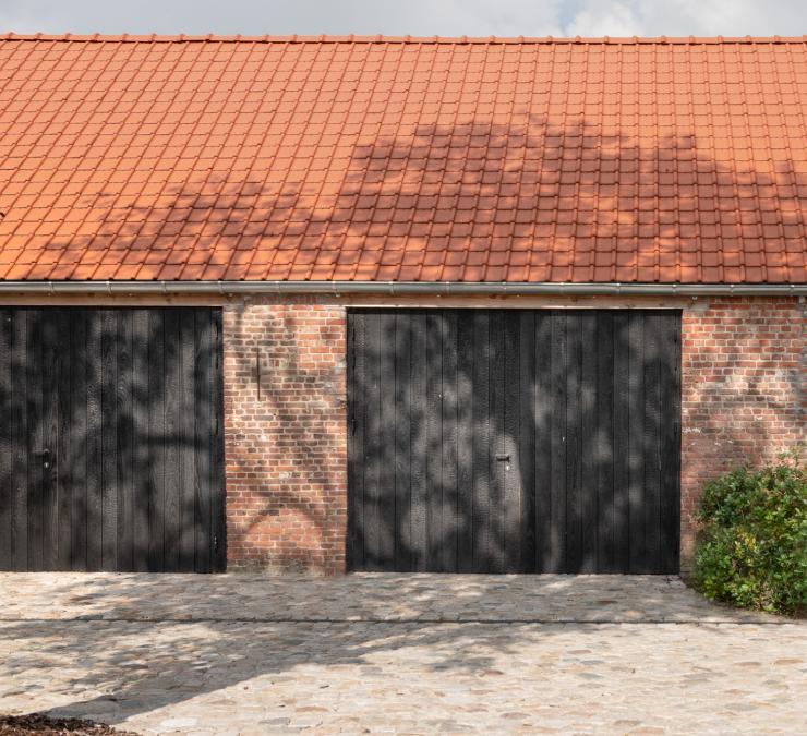 Garage doors in charred ash