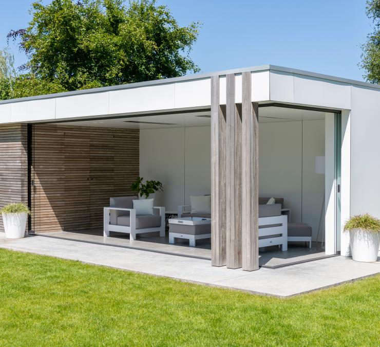 Vertical beams in HOTwood ash add dynamic touch in the wooden outbuilding