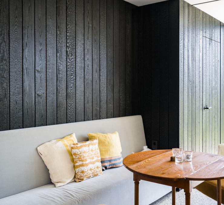 Wood panelling in charred thermo ash