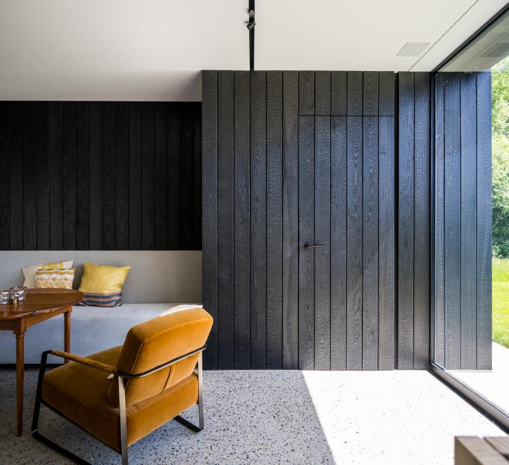 Wood panelling in charred thermo ash