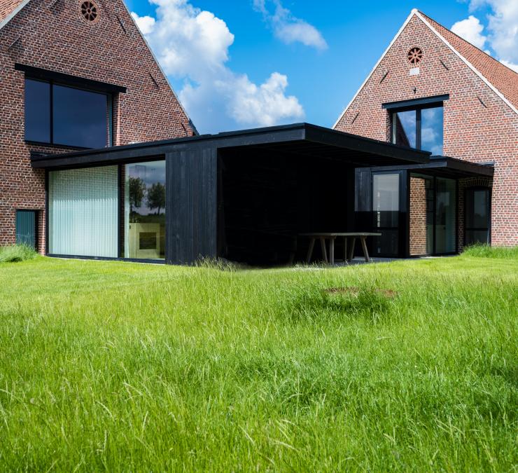 Wooden home extension in charred thermo ash