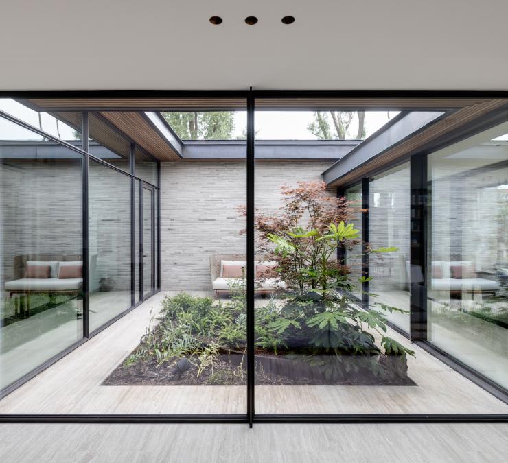 Timber cladding in thermo ash Fine line QC on patio house