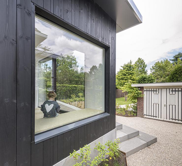 Timber cladding home extension HOTwood pine Plus line QC black 