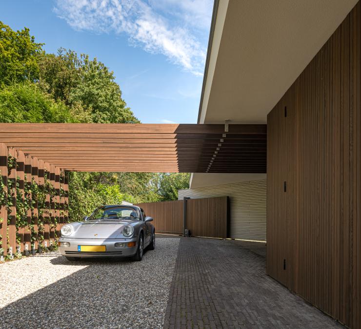 Timber cladding and carport in HOTwood ash