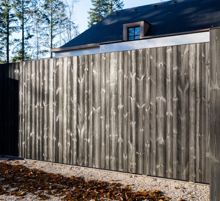 Modern automated sliding gate in thermo pine