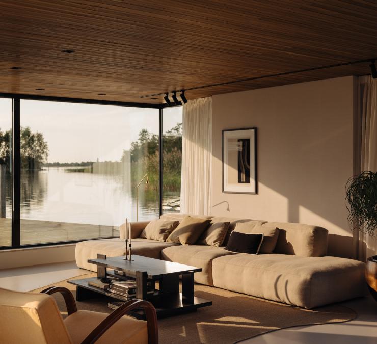 The wooden ceiling gives the living room a warm feel