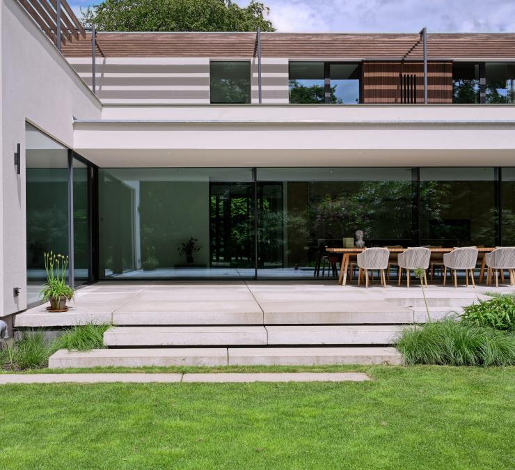 Horizontal wooden slat awning, used as a sun shield in a modern villa