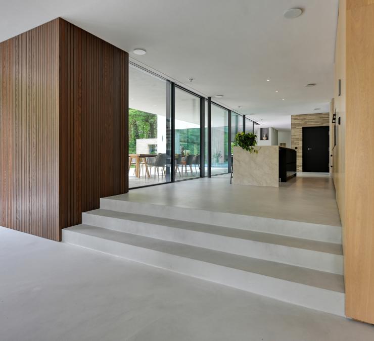 A lovely contrast between the oak kitchen and wall panelling in Ipe coloured, thermo ash wall panelling