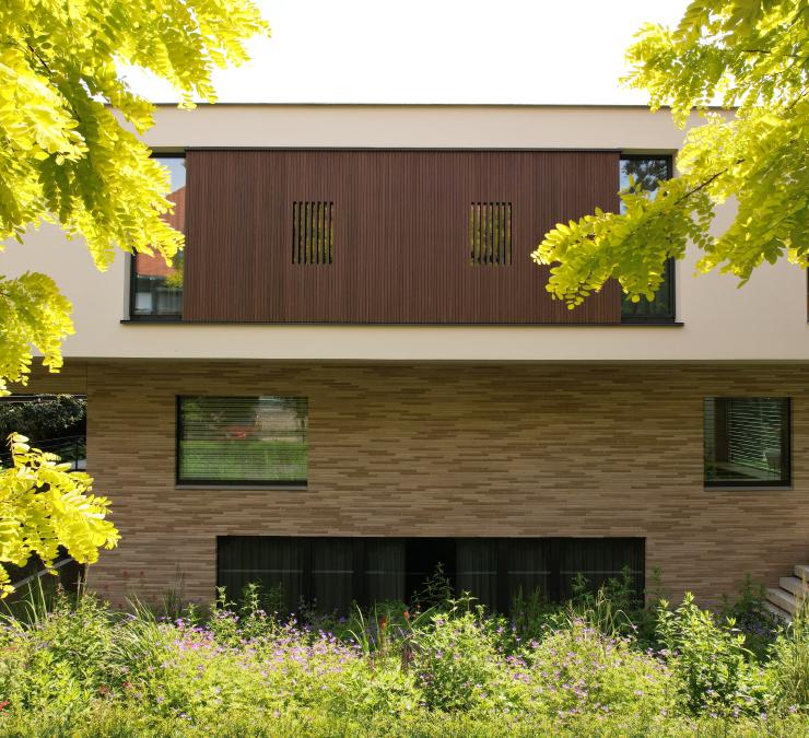 Timber cladding in Fine Line QC HOTwood ash, with an Ipe oil finish