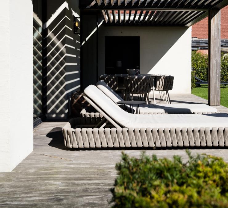 A modern wood canopy regulates sunlight on the terrace A modern wood canopy regulates sunlight on the terrace